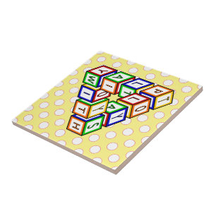 赤いおもしろい青の黄色の緑のおもちゃブロックアート タイル