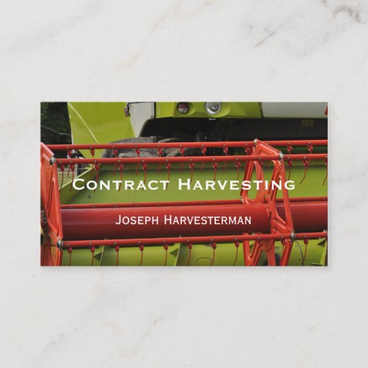 赤いおよび緑のコンバインハーベスターのクローズアップ 名刺 (正面)