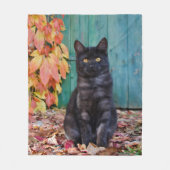 赤いの青いドアの黒猫かわいい子 フリースブランケット (正面)