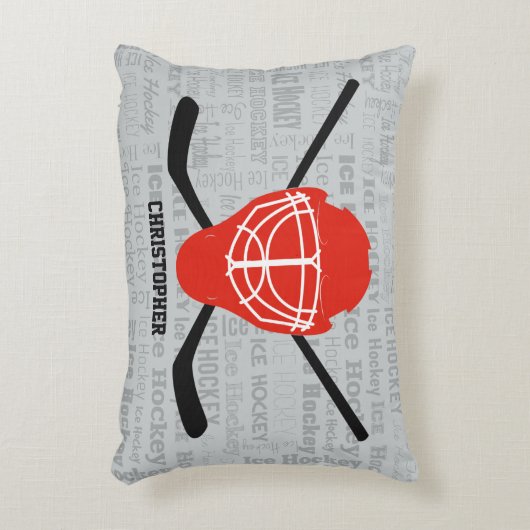 赤いアイスホッケーのヘルメットおよび棒のタイポグラフィ アクセントクッション (正面(垂直))