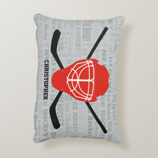 赤いアイスホッケーのヘルメットおよび棒のタイポグラフィ アクセントクッション (裏面(縦))