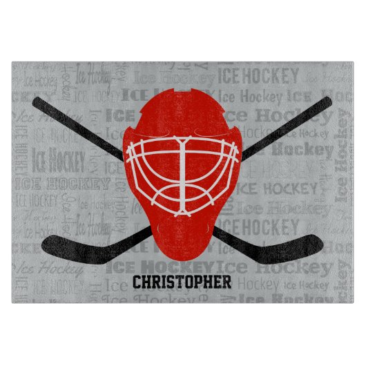 赤いアイスホッケーのヘルメットおよび棒のタイポグラフィ カッティングボード (正面)