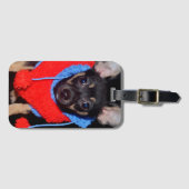 赤いウールセーターを着たかわいい子犬 ラゲッジタグ (正面横)