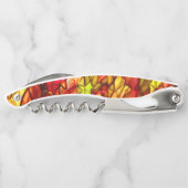 赤いオーニング生地の下に隠された交差コード ソムリエナイフ (裏面)