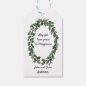 赤いガウンの天使が平和なハトでハートを持って来る ギフトタグ (裏面)