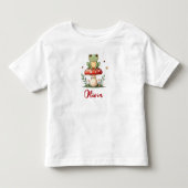 赤いキノコの上の可愛いカエル トドラーTシャツ (正面)