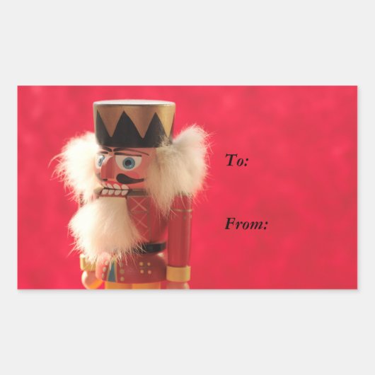 赤いギフトの上のナツクラッカーラベルシール 長方形シール (正面)