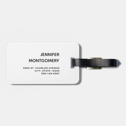 赤いクリスマスの帽子をかぶったかわいい白犬 ラゲッジタグ (裏面横)