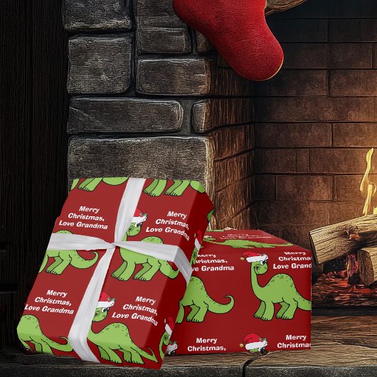 赤いクリスマスキッズ恐竜の可愛パーソナライズされたさ ラッピングペーパー