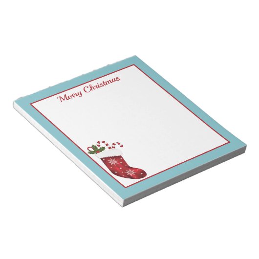 赤いクリスマスストッキングと青とカスタム文字 ノートパッド (アングル)
