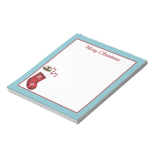 赤いクリスマスストッキングと青とカスタム文字 ノートパッド (回転)