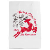 赤いクリスマストナカイのスノーフレーク名ホワイト ミディアムペーパーバッグ (裏面)