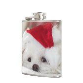 赤いクリスマス帽子をかぶったかわいい白い犬 フラスク (左)