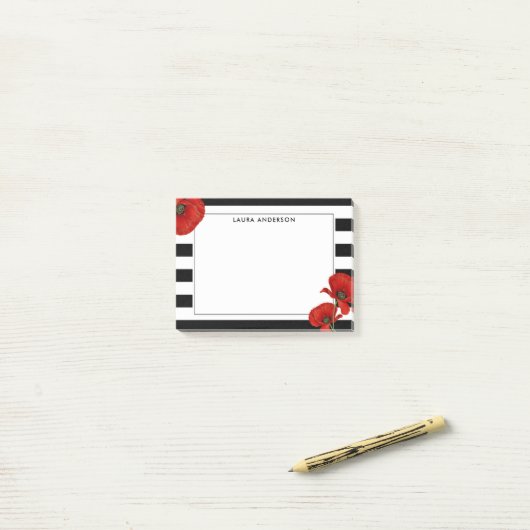 赤いケシの上に黒と白のストライプ ポストイット (デスク上)