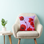 赤いケシの花の抽象的でカラフルで明るいピンク クッション (椅子)