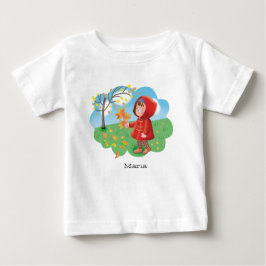 赤いコートを着たかわいい少女が秋の葉を集めている ベビーTシャツ