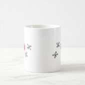 赤いゴム製球およびジャッキ コーヒーマグカップ (中央)