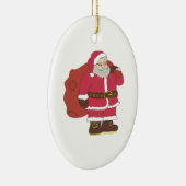 赤いサンタクロースに抱き枕とメガネ セラミックオーナメント (右)