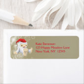 赤いサンタハットのクリスマススノーモンスタードール ラベル (インサイチュ)