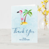 赤いサンタハットのピンクのフラミンゴがクリスマス カード (黄色い花)