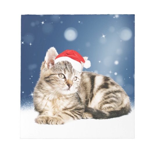 赤いサンタ帽をかぶった可愛い猫クリスマス雪 ノートパッド (正面)