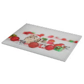 赤いサンタ帽子のクリスマスオーナメントを着た猫 カッティングボード (角)