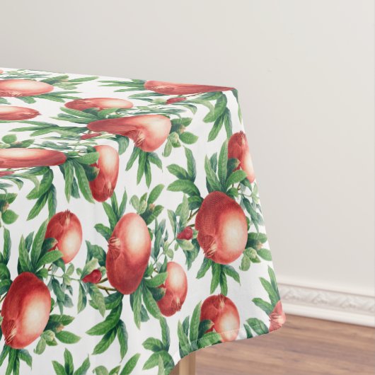赤いザクロの果実と緑葉の テーブルクロス (インサイチュ)