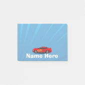 赤いスポーツ・カーが付いている明るい青は子供の男の子を炎にあてます ポストイット (正面)