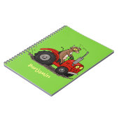 赤いトラクター漫画を運転する可愛い幸せな牛 ノートブック (左側)