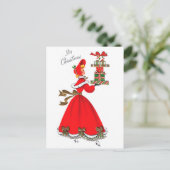 赤いドレスを着た若い女性にクリスマスプレゼントを贈る ポストカード (スタンド正面)