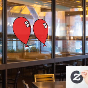 赤いハッピーバルーン双生窓が引っ掛かる ウィンドウサイン