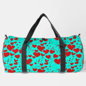 赤いハート図形のパターン(鮮やかなターコイズ) ダッフルバッグ (裏面)