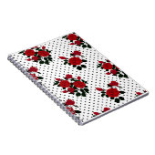 赤いバラが水玉模様の背景。 ノートブック (右側)