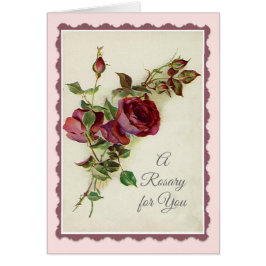 赤いバラの祈りの言葉が付いている神聖な数珠