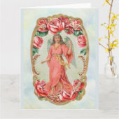 赤いビクトリアンバラに囲まれたクリスマスエンジェル カード (黄色い花)