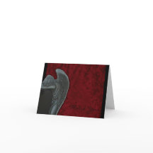 赤いビロードの結婚式のゴシック様式天使は感謝していしています