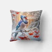 赤いベリーの木で歌う冬の青いジェイ クッション (裏面)