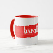 赤いペイントマグカップのBREATHEテキスト マグカップ (正面左)