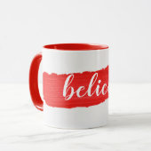 赤いペンキのマグカップに書かれたBELIEVEの文字 マグカップ (正面左)