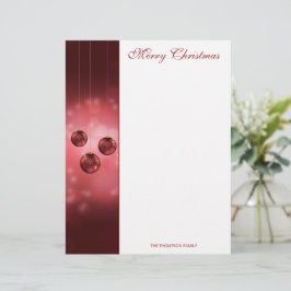 赤いボケを背景にしたクリスマス・ボール レターヘッド