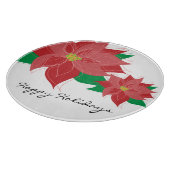 赤いポインセチアの幸せな休日 カッティングボード (角)