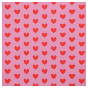 赤いラブハートがピンクのかわいい ファブリック
