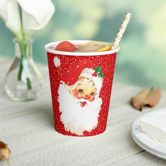 赤いラメの紙コップにクリスマスのサンタクロース 紙コップ (インサイチュ)