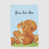 赤いリスのふわふわした尻紅食べ頬の木の実 ゴルフタオル (正面)