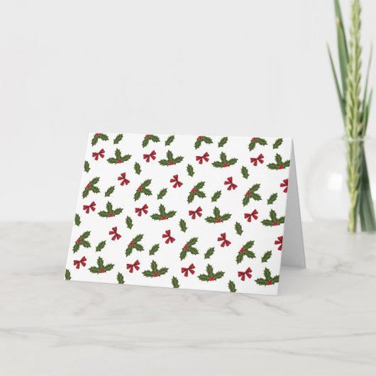 赤いリボンとクリスマスホーリーの植物の模様とテキスト シーズンカード (正面)
