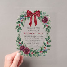 赤いリボンのフラワーの冬のクリスマスの結婚式 