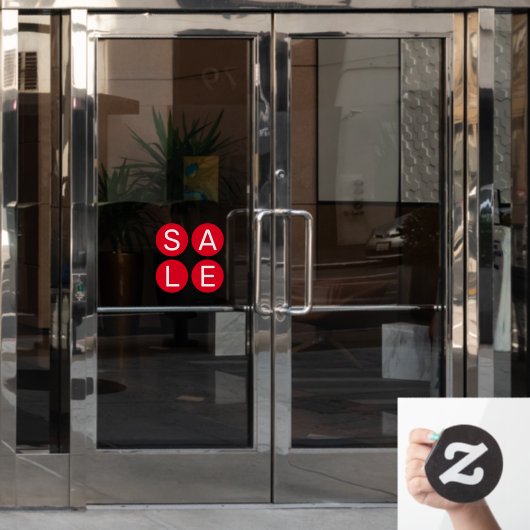 赤い丸の窓の上に販売標識の白い文字を貼る ウィンドウサイン (オフィスドア)