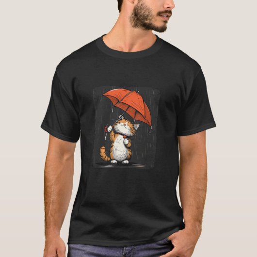 赤い傘の下にかわいい小さな猫 Tシャツ (正面)