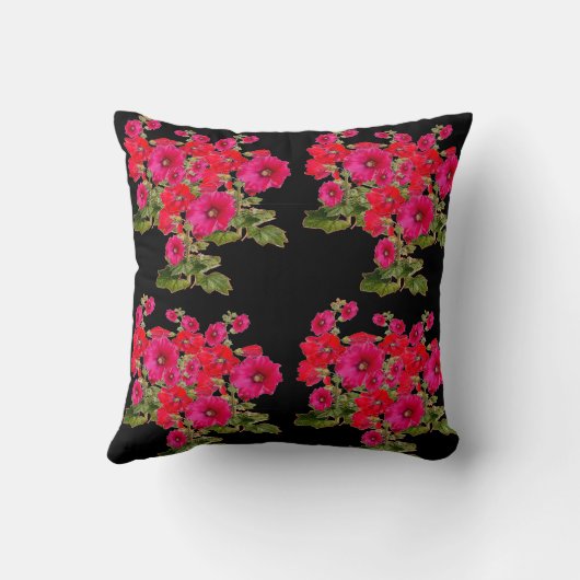 赤い及び赤紫のピンクのHOLLYHOCKSの黒い庭の芸術 クッション (裏面)