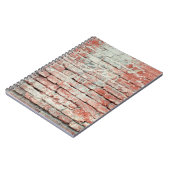 赤い古い擦り切れたレンガの壁のテクスチャ背景。ビンタグ ノートブック (左側)